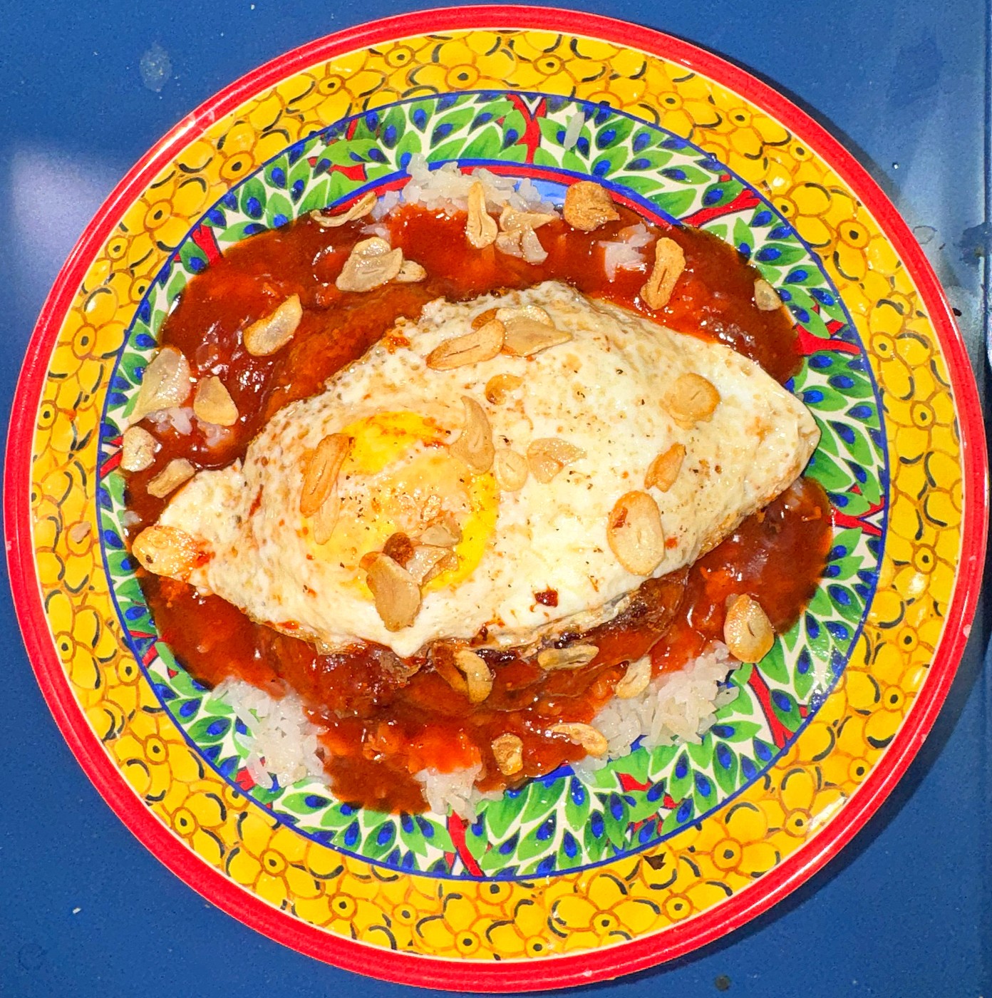 Filipino loco moco with longanisa and banana ketchup gravy